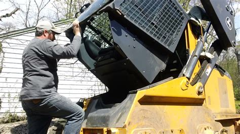 how to raise cab roof on john deere skid steer|john deere 317 skid steer lift.